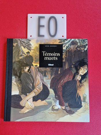 Bd témoins muets, EO