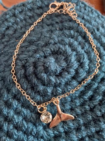 Chaîne de cheville avec pendentif en forme de queue de dauphin