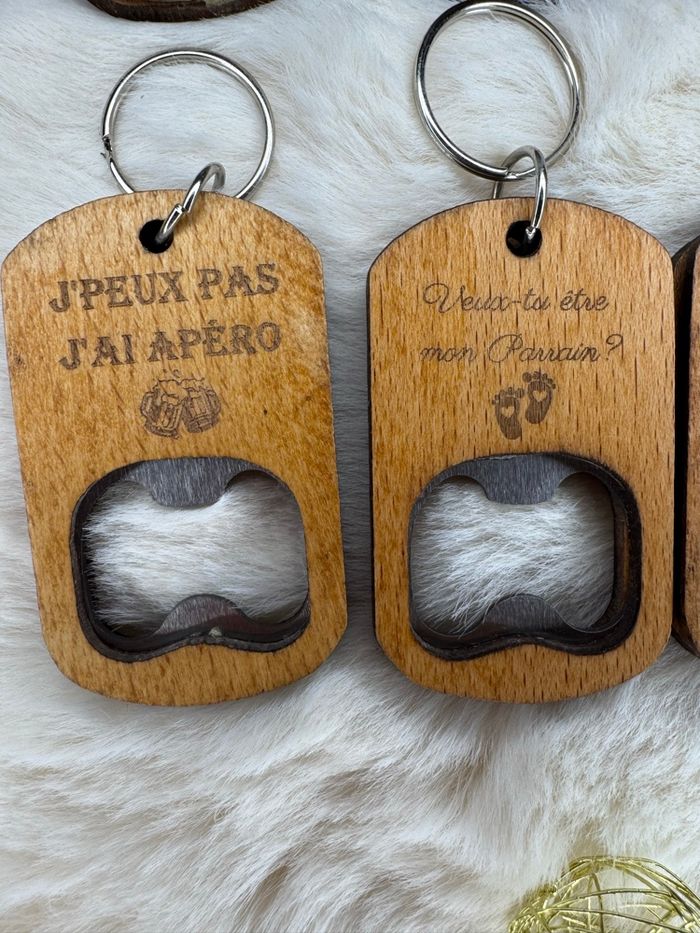 Porte clé ouvre bouteille