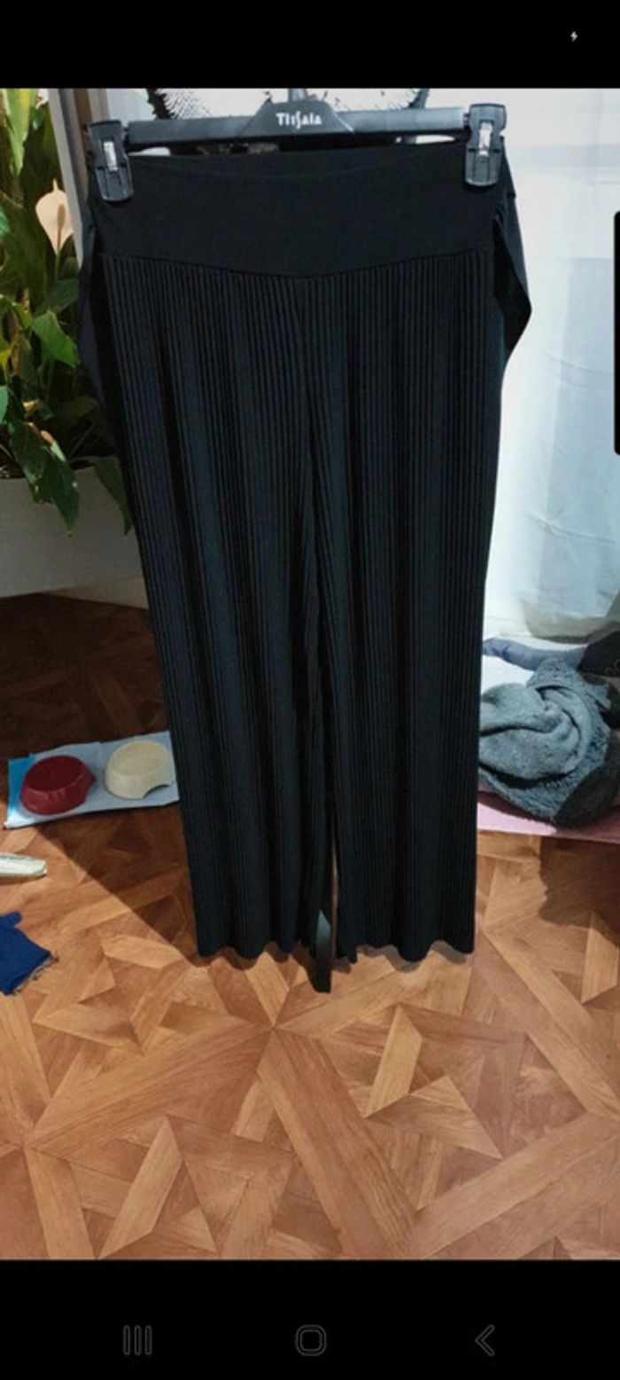 Pantalon large et plissé