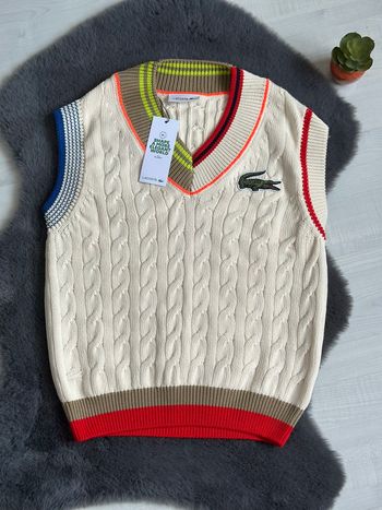 Pull sans manche torsadée Lacoste taille 34