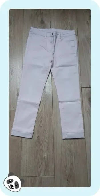 Pantacourt tape à l'oeil rose clair 12 ans en très bon état