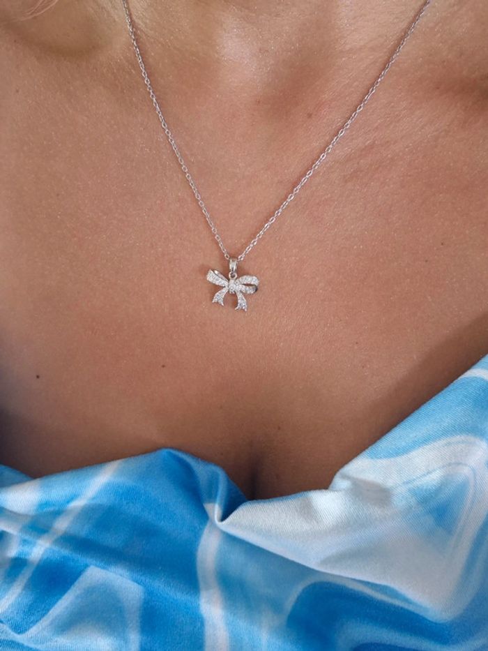 Jolie collier femme noeud en acier