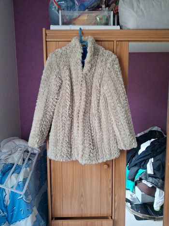 Blouson fausse fourrure gris