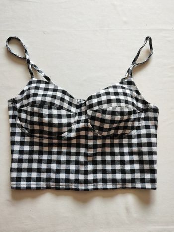 Petit haut à carreaux noir et blanc taille XS très bon état