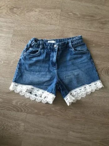 Short Gemo taille 12 ans excellent état
