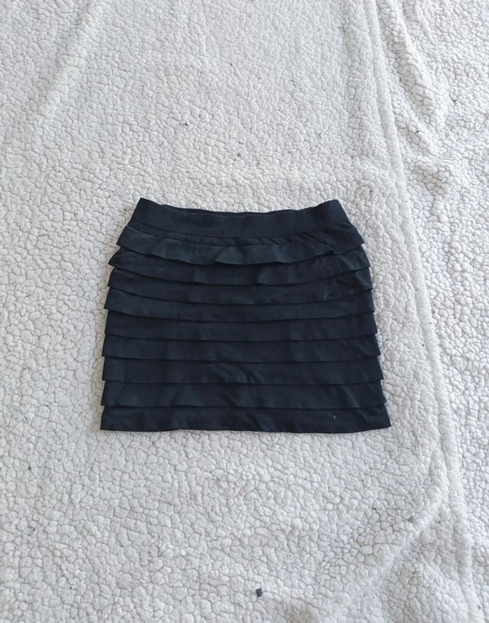 Mini jupe noire à volants superposés taille S vintage chic sexy