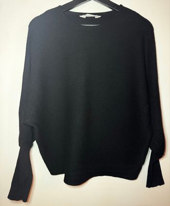 Pull noir manches bouffantes /