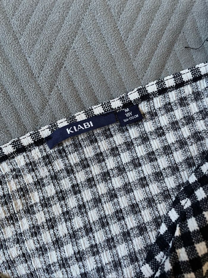 Top Kiabi noir et blanc manche bouffante taille M - photo numéro 6