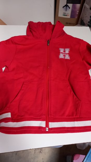 Veste rouge. 8ans.