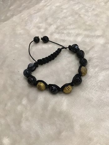 Joli bracelet cordon porte-bonheur