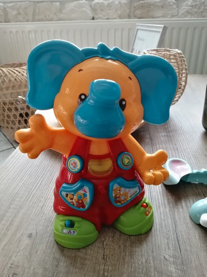 Jouet bébé "L'ourson à chansons" - photo numéro 9