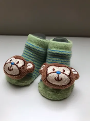 Chaussons grelots singe