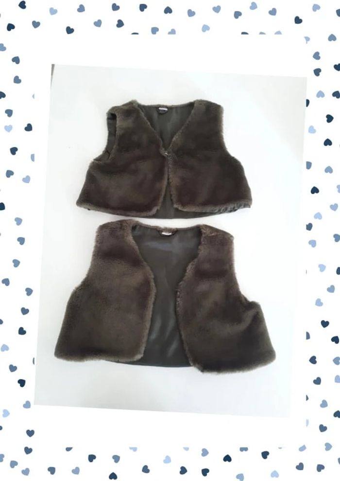 2 boléros effet fourrure 5/6 ans