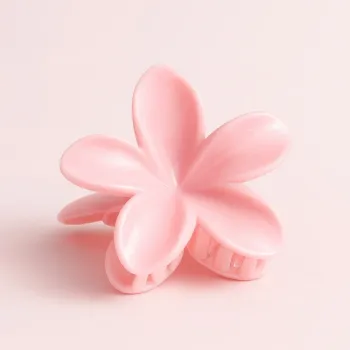 Pince à cheveux fleur rose poudré
