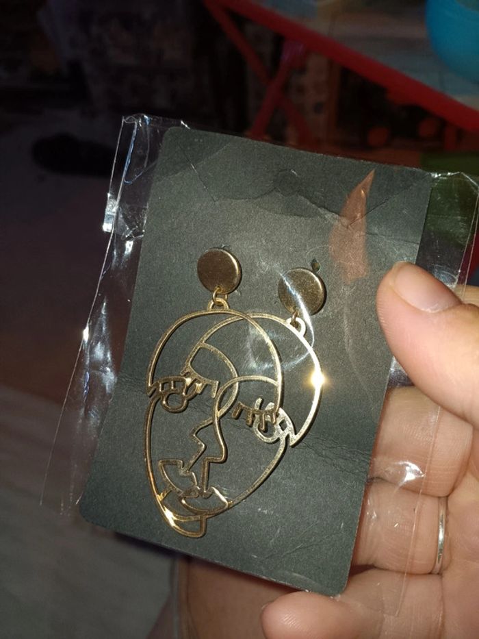 Boucle d'oreilles fantaisies visage