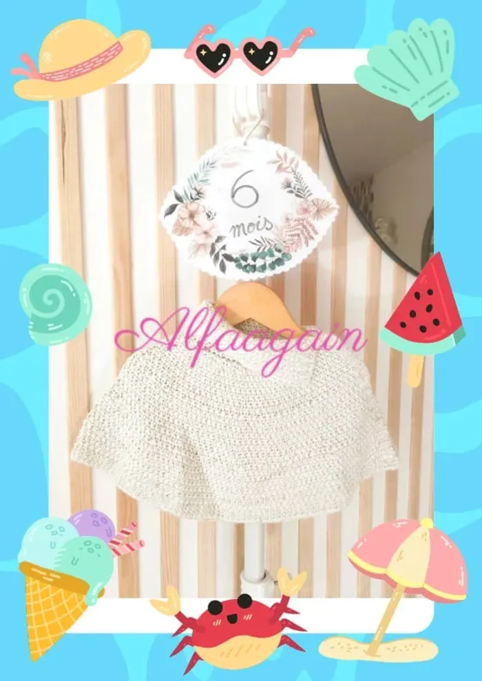 Châle mailles Kiabi 6mois neuf