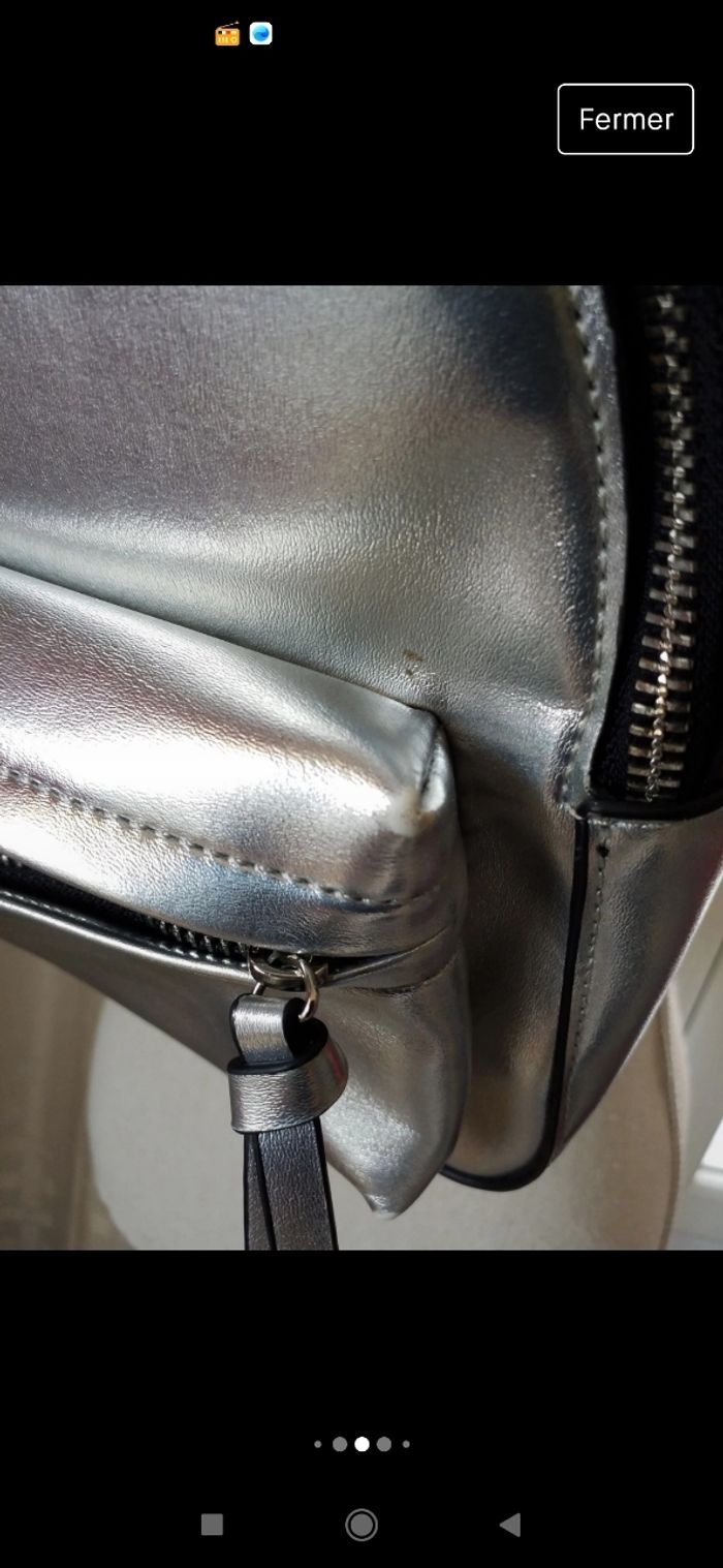 Sac à dos argenté bon état - photo numéro 4