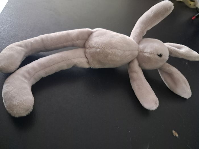 Une petite peluche lapin gris - photo numéro 2