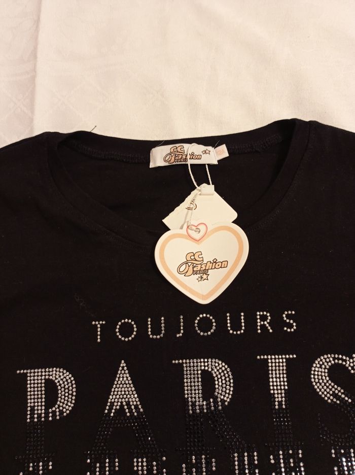Taille 12 ans pull noir manche courte ou tunique voir photos neuf jamais porté magnifique avec fermeture et strass brillant