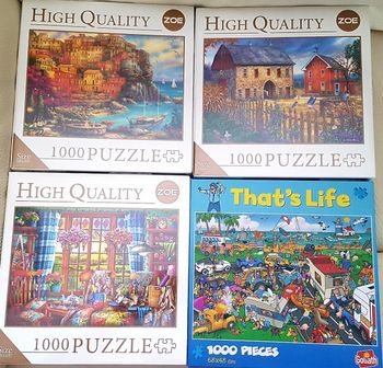 Lot de 4 puzzles en 1000 pièces dont 3 Neufs