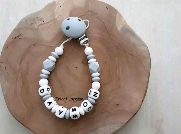 Attache tétine mixte