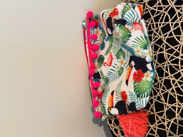 Trousse de toilette en tissu floral toucan
