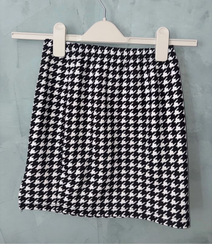 Jupe noire et blanche fille taille 11-12 ans