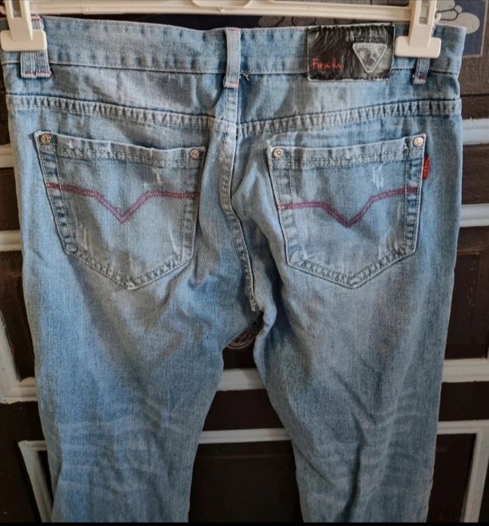Jeans à trous taille 44 mixte - photo numéro 4