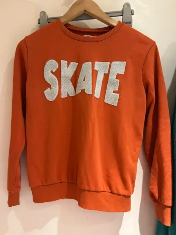 Sweat orange SKATE – Gémo – Taille 12 ans