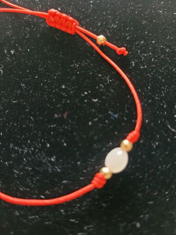 Bracelet fantaisie rouge et doré perle rose