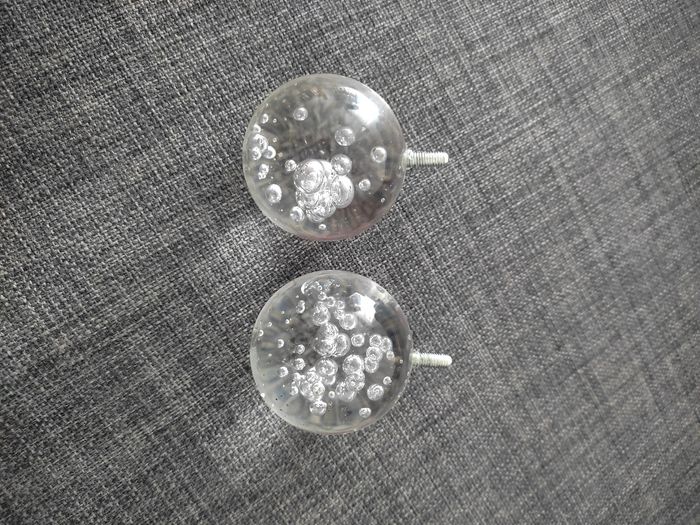 Embouts pour tringle à rideaux