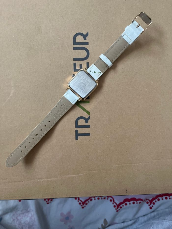 montre blanche et dorée - photo numéro 3