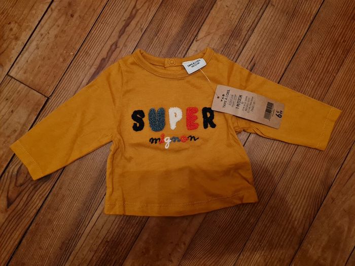 Tee shirt tape à l'œil taille 1 mois neuf