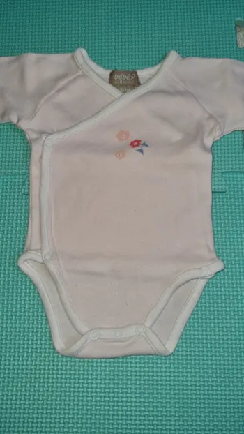 Body manche longue 0/1 mois en bon état