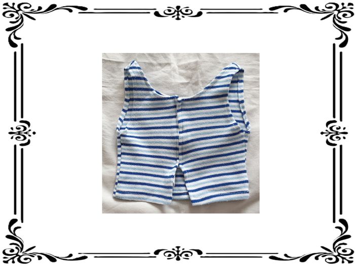 Gilet pour poupon. - photo numéro 2