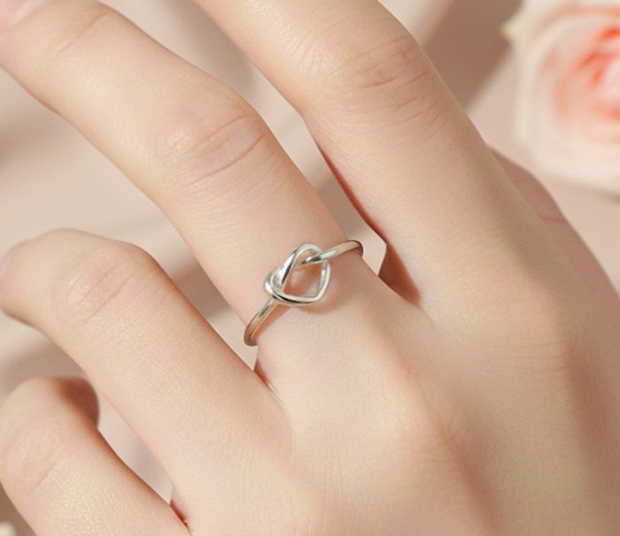 Bague argentée noeud coeur réglable en acier inoxydable - photo numéro 3