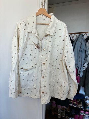 Veste blanche à fleurs état neuf