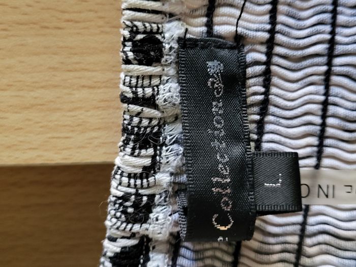 Haut "Collection" Taille L en bon état. - photo numéro 10