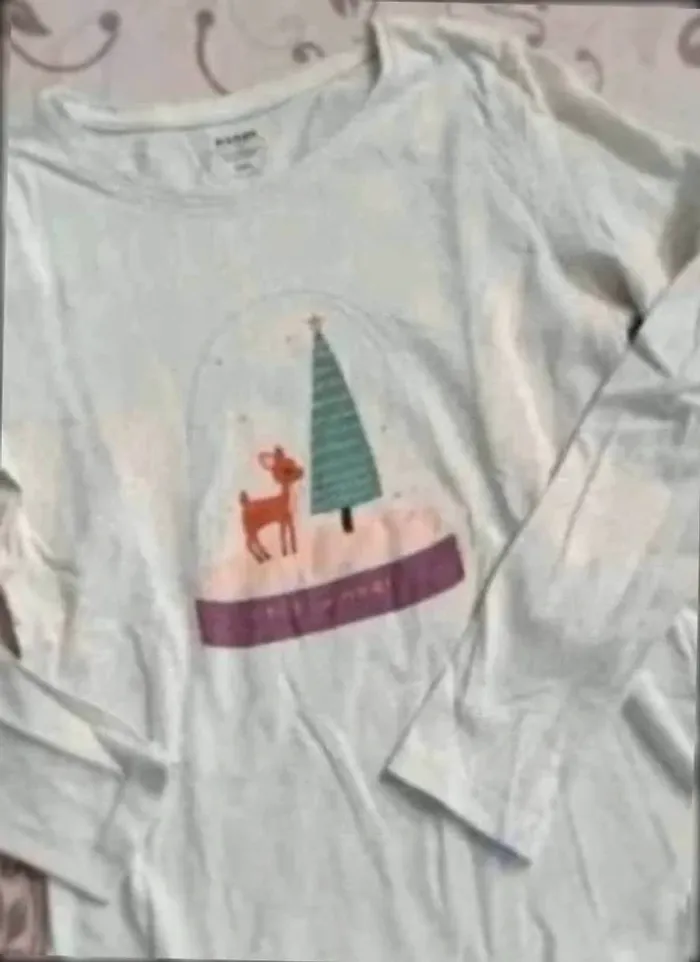 Tee  shirt ml kiabi  bon  état  8  ans