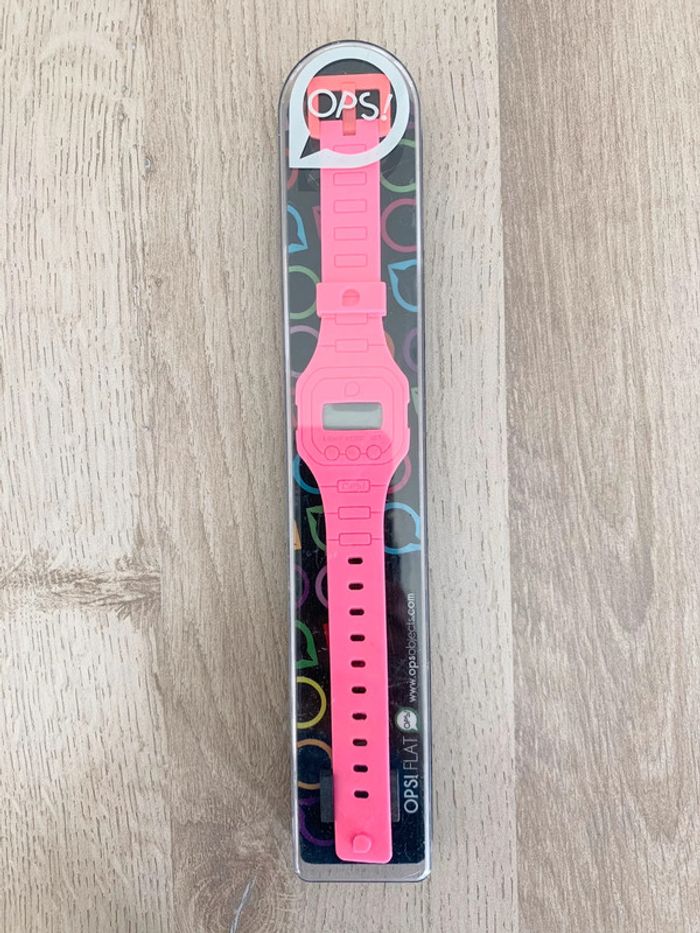 Montre ops rose neuve pile à remplacer jamais portée