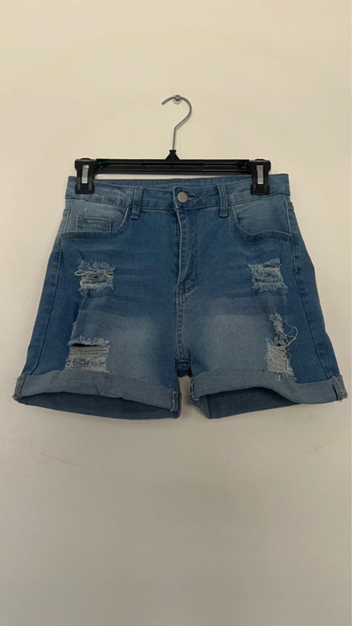 Short en jean en parfait état taille M . 85% coton