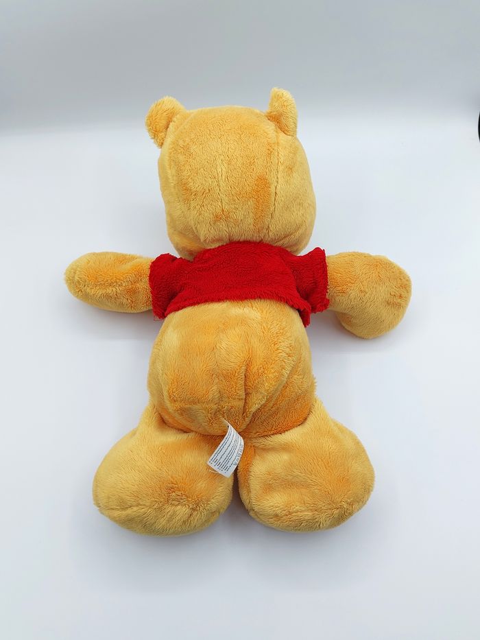 Peluche doudou Winnie l’ourson gros pieds DISNEY NICOTOY SIMBA 35 cm - photo numéro 4