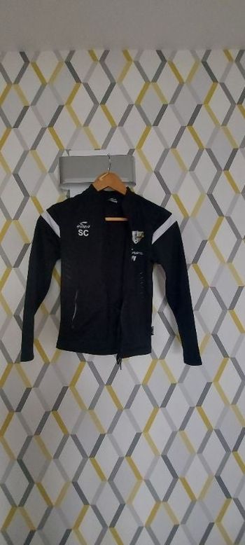 Veste de survêtement  8/10 ans