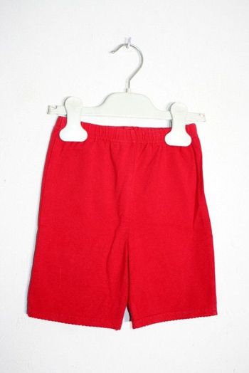 Short H&M rouge taille très grand