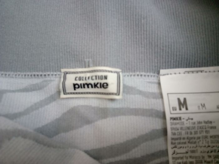 Pantalon blanc et gris