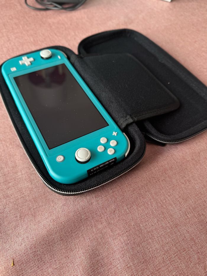NItendo Switch lite turquoise - photo numéro 3