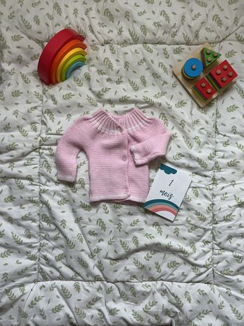 brassière en laine rose 1 mois