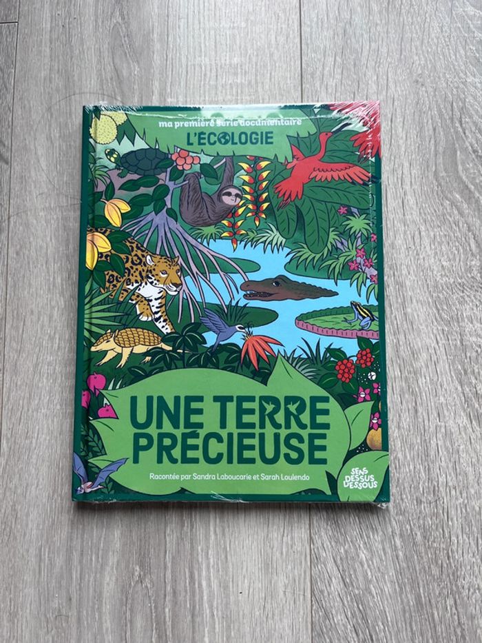 Livre documentaire « une terre précieuse » Neuf