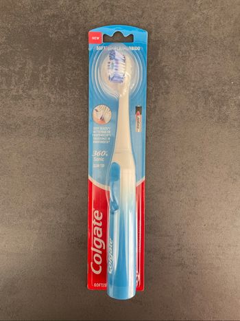 Brosse à dents électrique avec gratte langue